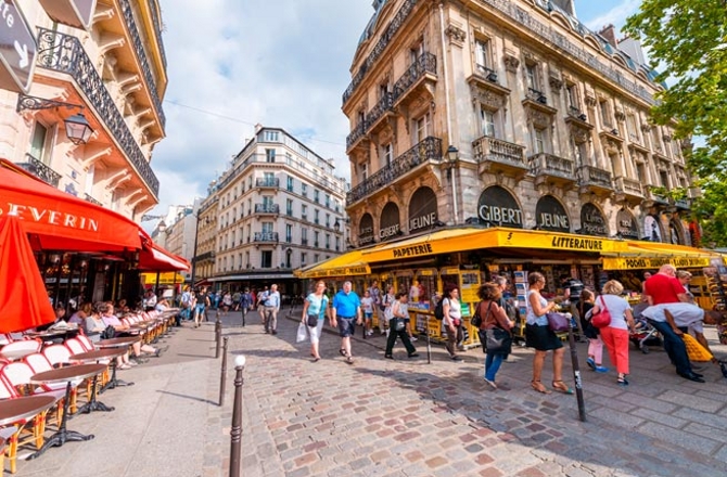PARIS - MAY 21, 2014: Tourists walk in Quartier Latin. More than 30 million people visit Paris annually.; Shutterstock ID 235993762; Project/Title: 15 Things Not to Do in Paris; Downloader: Fodor's Travel