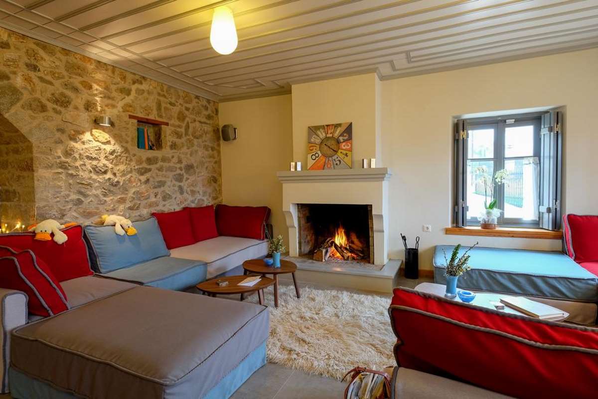 Kyriaki Guesthouse, σαλόνι με τζάκι