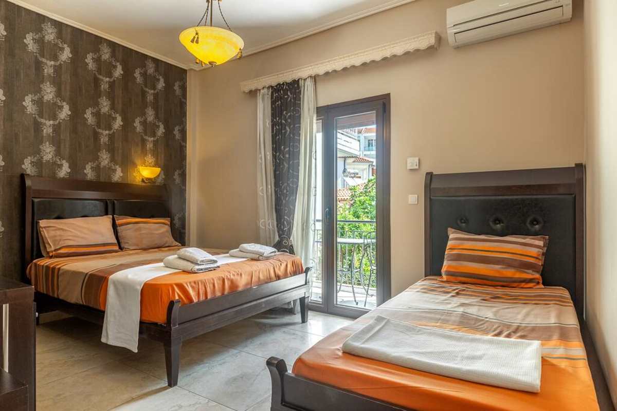 toti boutique hotel τρίκλινο δωμάτιο