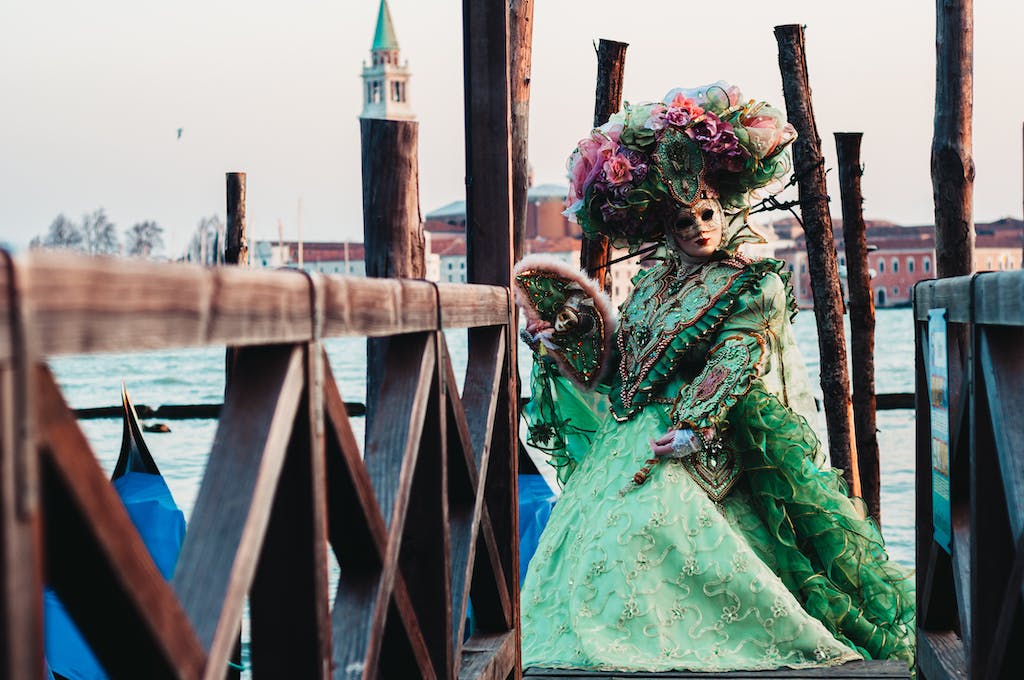 A Woman Dressed in Green Gown